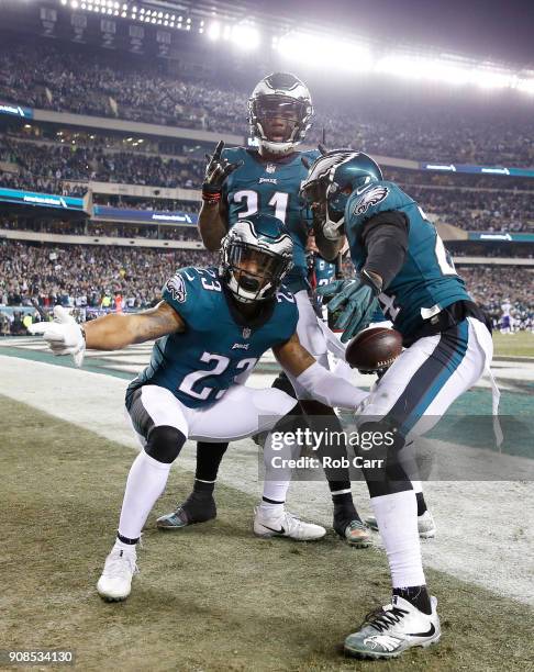 Corey Graham of the Philadelphia Eagles is congratulated by his teammates after getting an interception during the fourth quarter against the...