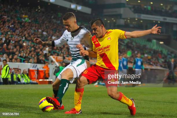 Jonathan Rodriguez of Santos and Aldo Rocha of Morelia fight for the ball during the third round match between Santos Laguna and Monarcas as part of...