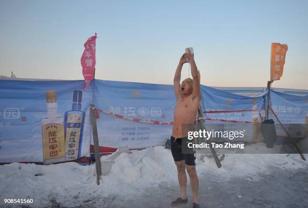 Winter swimmer rinses off near the SongHua River as recent temperatures dropped to as low as -35 C on January 22, 2018 in Harbin, China.