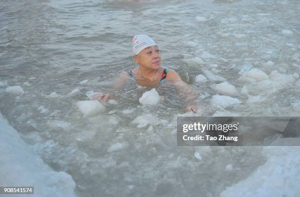 Winter swimmer braves the SongHua River as recent temperatures dropped to as low as -35 C on January 22, 2018 in Harbin, China.