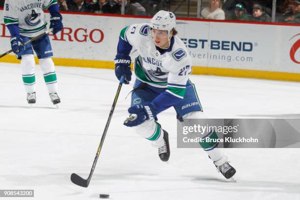 Ben Hutton of the Vancouver Canucks skates with the puck against the Minnesota Wild during the game at the Xcel Energy Center on January 14, 2018 in...