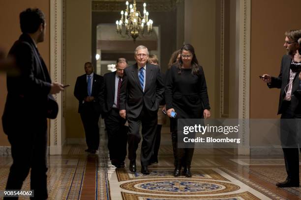 Senate Majority Leader Mitch McConnell, a Republican from Kentucky, center, walks to the Senate Chamber at the U.S. Capitol in Washington, D.C.,...