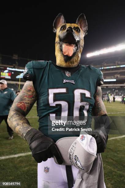 Chris Long of the Philadelphia Eagles celebrates his teams win while wearing a dog mask over the Minnesota Vikings in the NFC Championship game at...