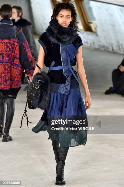 Model walks the runway during the Sacai Menswear Fall/Winter 2018-2019 show as part of Paris Fashion Week on January 20, 2018 in Paris, France.