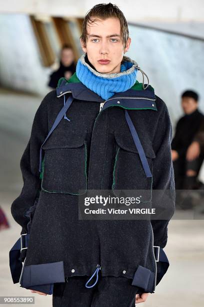 Model walks the runway during the Sacai Menswear Fall/Winter 2018-2019 show as part of Paris Fashion Week on January 20, 2018 in Paris, France.