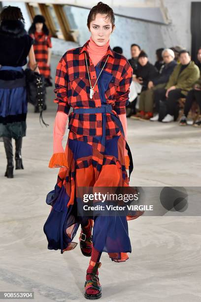 Model walks the runway during the Sacai Menswear Fall/Winter 2018-2019 show as part of Paris Fashion Week on January 20, 2018 in Paris, France.