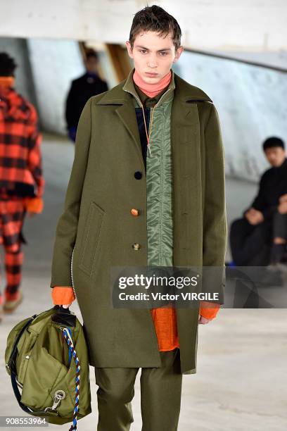 Model walks the runway during the Sacai Menswear Fall/Winter 2018-2019 show as part of Paris Fashion Week on January 20, 2018 in Paris, France.