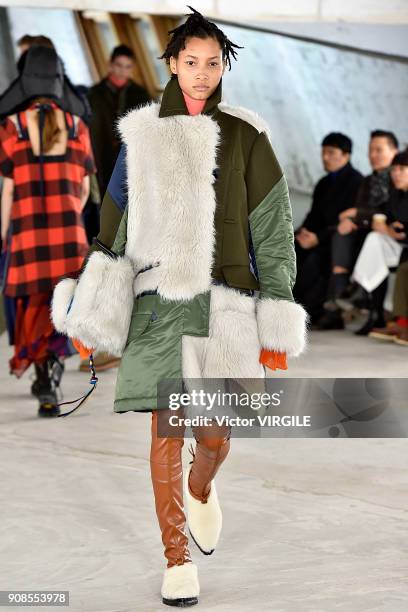 Model walks the runway during the Sacai Menswear Fall/Winter 2018-2019 show as part of Paris Fashion Week on January 20, 2018 in Paris, France.