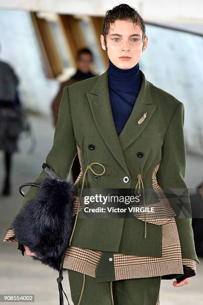 Model walks the runway during the Sacai Menswear Fall/Winter 2018-2019 show as part of Paris Fashion Week on January 20, 2018 in Paris, France.