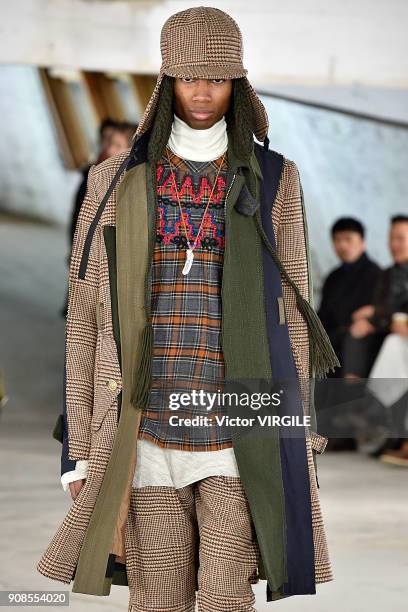 Model walks the runway during the Sacai Menswear Fall/Winter 2018-2019 show as part of Paris Fashion Week on January 20, 2018 in Paris, France.