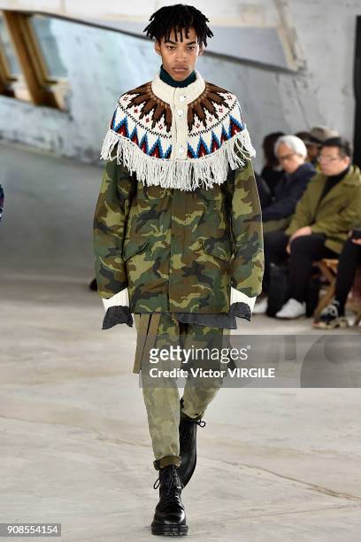 Model walks the runway during the Sacai Menswear Fall/Winter 2018-2019 show as part of Paris Fashion Week on January 20, 2018 in Paris, France.