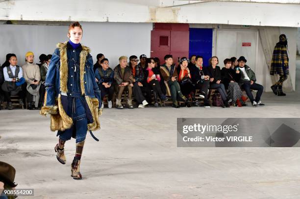 Model walks the runway during the Sacai Menswear Fall/Winter 2018-2019 show as part of Paris Fashion Week on January 20, 2018 in Paris, France.