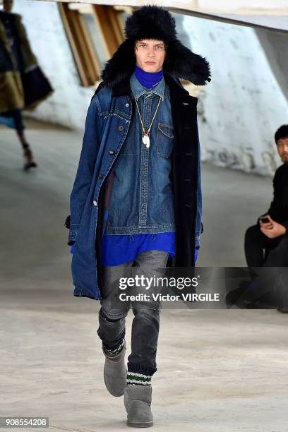 Model walks the runway during the Sacai Menswear Fall/Winter 2018-2019 show as part of Paris Fashion Week on January 20, 2018 in Paris, France.