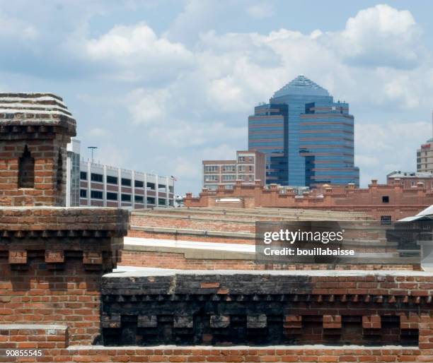 corporate office juxtaposed with brick buildings - edward-lambton-7th-earl-of-durham stockfoto's en -beelden