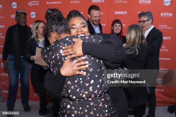 Condola Rashad hugs Stacey Sargeant during the 2018 Sundance Film Festival World Premiere of Netflix's "Come Sunday" at Eccles Center Theatre on...