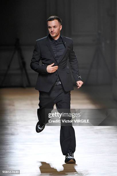 Fashion designer Kris Van Assche walks the runway during the Dior Homme Menswear Fall/Winter 2018-2019 show as part of Paris Fashion Week January 20,...