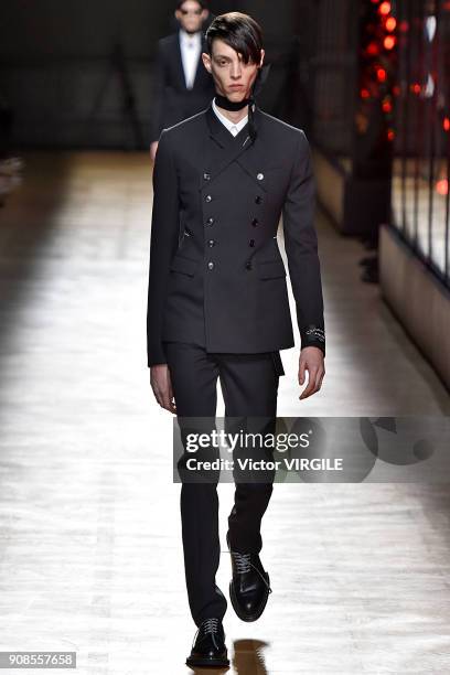 Model walks the runway during the Dior Homme Menswear Fall/Winter 2018-2019 show as part of Paris Fashion Week January 20, 2018 in Paris, France.