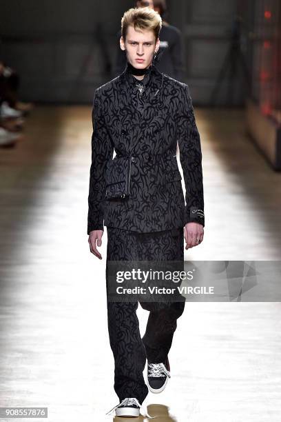 Model walks the runway during the Dior Homme Menswear Fall/Winter 2018-2019 show as part of Paris Fashion Week January 20, 2018 in Paris, France.