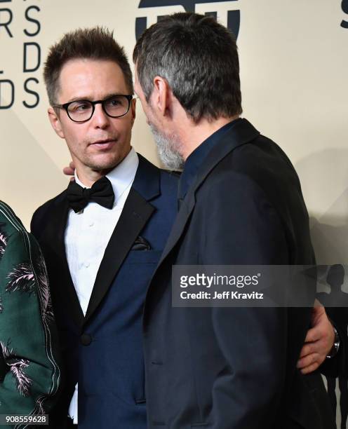 Actors Sam Rockwell and John Hawkes pose in the press room during the 24th Annual Screen Actors Guild Awards at The Shrine Auditorium on January 21,...