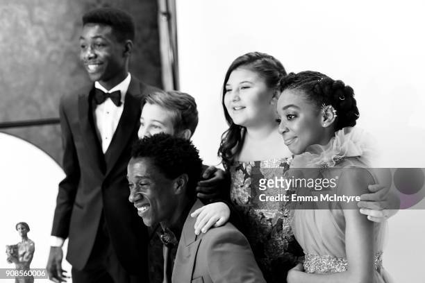 Actors Niles Fitch, Parker Bates, Jermel Nakia, Mackenzie Hancsicsak, and Eris Baker pose together with award for Outstanding Performance by an...