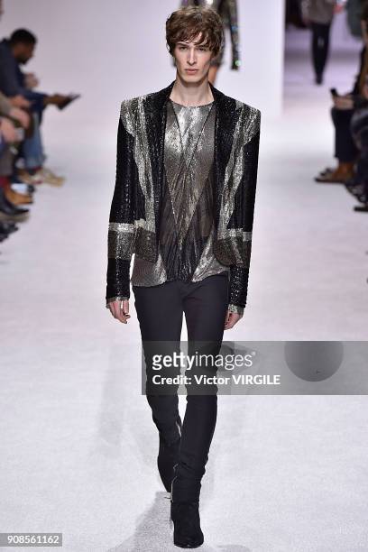 Model walks the runway during the Balmain Homme Menswear Fall/Winter 2018-2019 show as part of Paris Fashion Week on January 20, 2018 in Paris,...