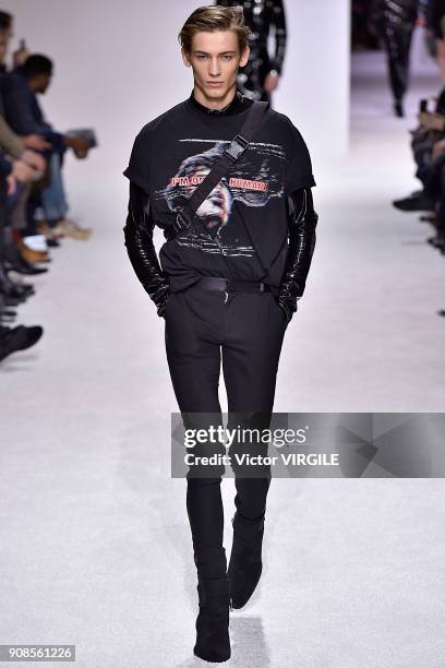 Model walks the runway during the Balmain Homme Menswear Fall/Winter 2018-2019 show as part of Paris Fashion Week on January 20, 2018 in Paris,...