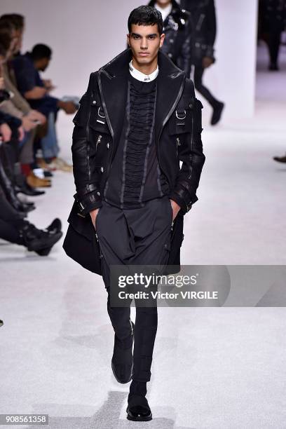 Model walks the runway during the Balmain Homme Menswear Fall/Winter 2018-2019 show as part of Paris Fashion Week on January 20, 2018 in Paris,...