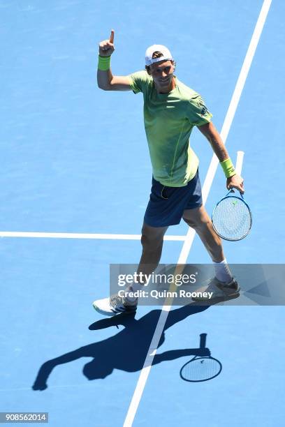 Tomas Berdych of the Czech Republic celebrates winning match point in his fourth round match against Fabio Fognini of Italy on day eight of the 2018...