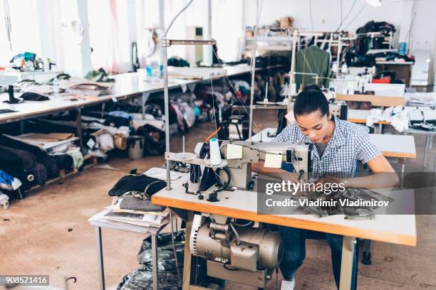 tailor and worker in chinese clothes factory - sewing machine stock pictures, royalty-free photos & images
