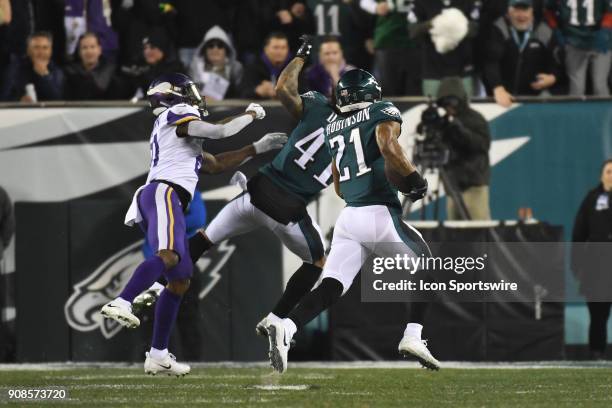 Philadelphia Eagles cornerback Patrick Robinson gets a block from Philadelphia Eagles cornerback Ronald Darby after his interception for a touchdown...