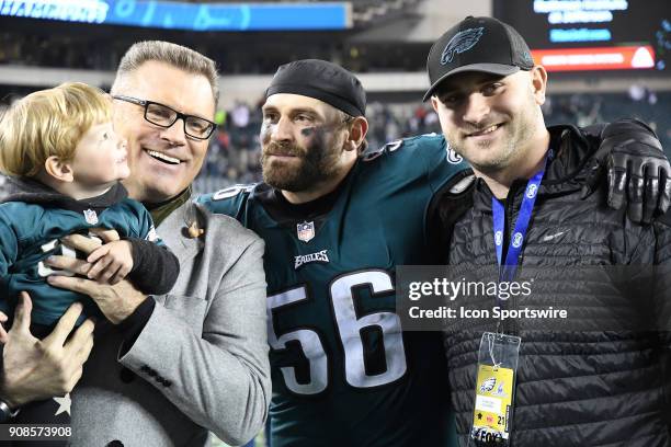 Philadelphia Eagles defensive end Chris Long poses with his father Howie Long and brother Kyle Long during the NFC Championship game between the...