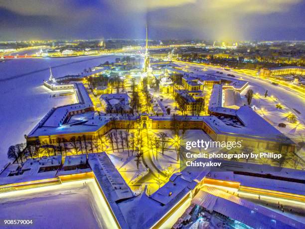 st. peter and paul cathedral at winter evening - fuerte de pedro y pablo fotografías e imágenes de stock