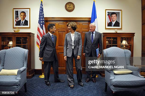 French Minister of State for Foreign Trade Anne-Marie Idrac poses with US Commerce Secretary Gary Locke and French Ambasador to the US Pierre Vimont...