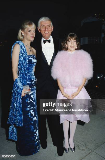 American film and television producer Aaron Spelling with his wife Candy and their daughter Tori Spelling at the Santa Monica Civic Auditorium in...