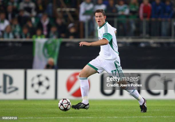 Alexander Madlung of Wolfsburg plays the ball during the UEFA Champions League Group B match between VfL Wolfsburg and CSKA Moscow at Volkswagen...
