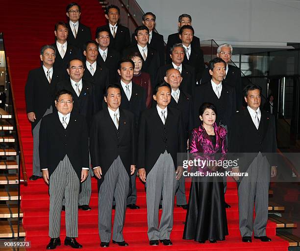 New Prime Minister and President of the ruling Democratic Party of Japan Yukio Hatoyama and his new cabinet members pose at the Prime Minister's...