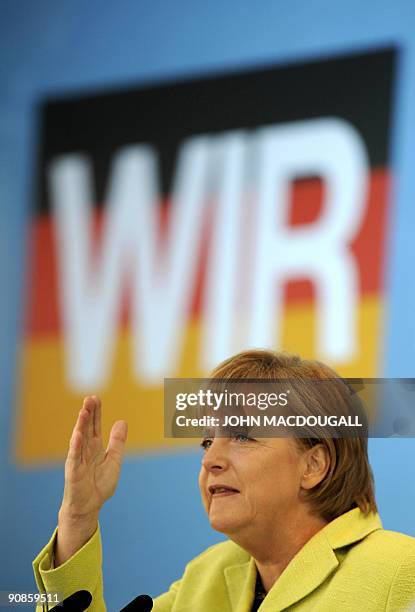 Christian Democratic Union leader and German Chancellor Angela Merkel addresses a campaign rally in Schwerin, northern Germany on September 16, 2009....