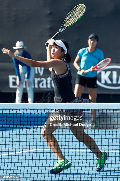 Anri Nagata of Japan and Moyuka Uchijima of Japan compete in their girl's doubles match against Elisabetta Cocciaretto of Italy and Sada Nahimana of...