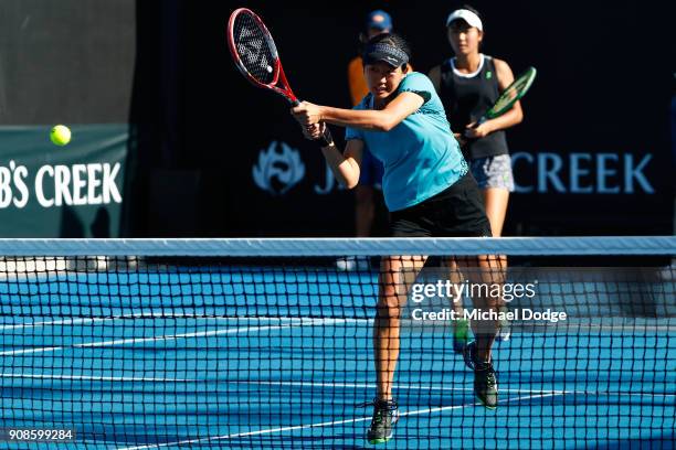 Anri Nagata of Japan and Moyuka Uchijima of Japan compete in their girl's doubles match against Elisabetta Cocciaretto of Italy and Sada Nahimana of...