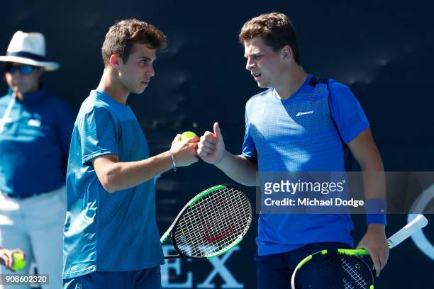 Hugo Gaston of France and Clement Tabur of France compete in their boy's doubles match against Jesper De Jong of the Netherlands and Yanki Erel of...