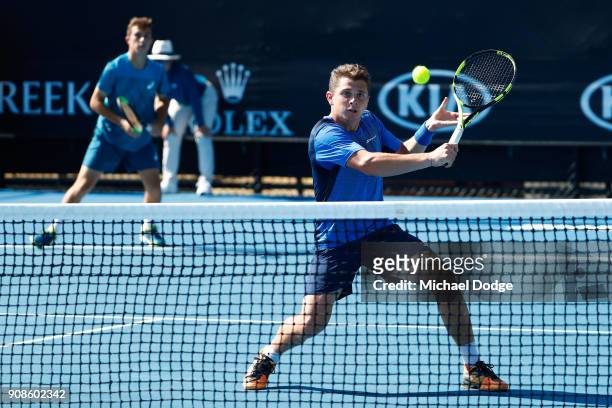 Hugo Gaston of France and Clement Tabur of France compete in their boy's doubles match against Jesper De Jong of the Netherlands and Yanki Erel of...