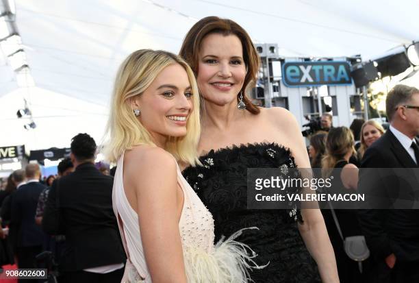 Actresses Margot Robbie and Geena Davis arrive for the 24th Annual Screen Actors Guild Awards at the Shrine Exposition Center on January 21 in Los...