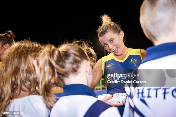 Jordyn Holzberger of the Hockeyroos signs autographs during game five of the International Test match series between the Australian Hockeyroos and...