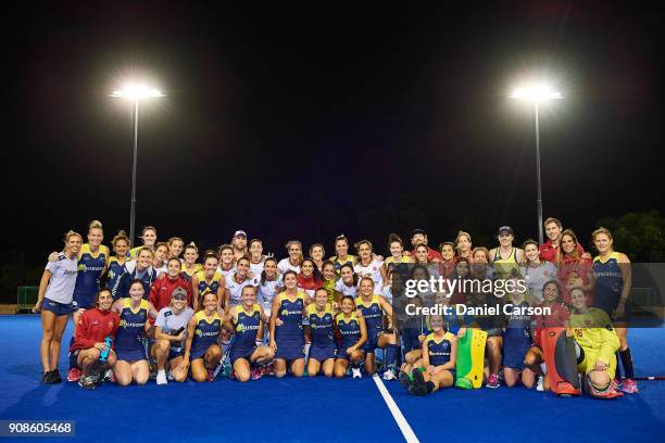 The two teams pose for a photo during game five of the International Test match series between the Australian Hockeyroos and Spain at Warwick Hockey...