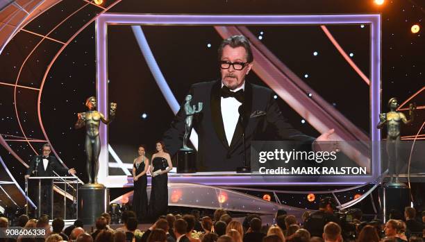 Actor Gary Oldman accepts the award for Best Actor during the 24th Annual Screen Actors Guild Awards show at The Shrine Auditorium on January 21,...