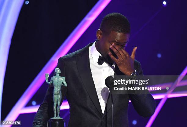 Sterling K. Brown accepts the Outstanding Performance by a Male Actor in a Drama Series award for 'This Is Us' onstage during the 24th Annual Screen...