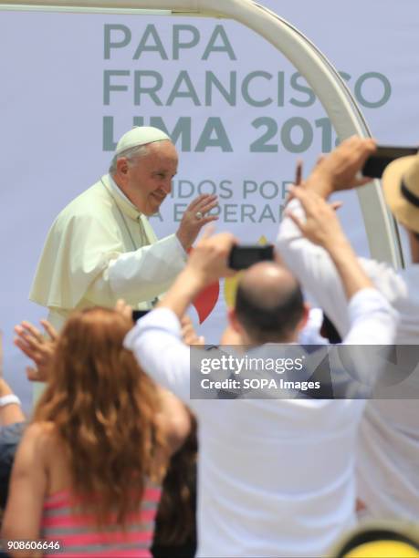 Pope Francis seen riding through the crowd after the Marian Angelus prayer ended. On his last day in Peru, Pope Francis prayed the Marian Angelus...