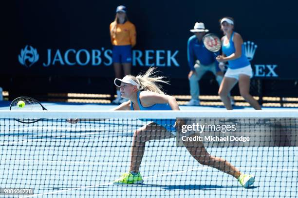 Lisa Mays of Australia and Amber Marshall of Australia compete in their girl's doubles match against Sohyun Park of Korea and Mananchaya Sawangkaew...