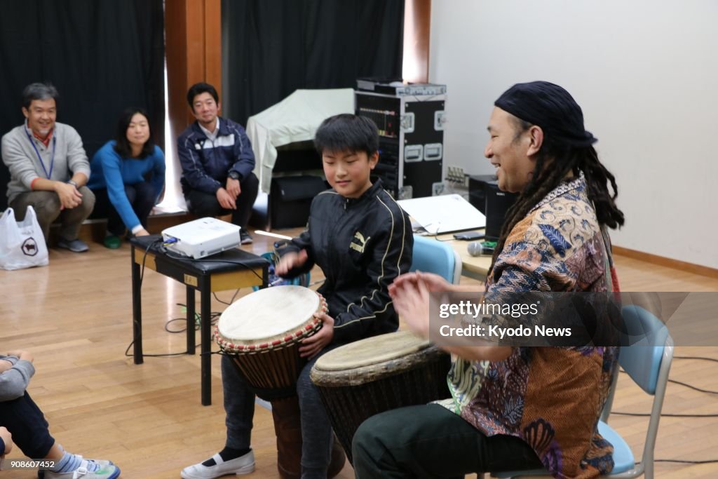 FEATURE: Japanese photographer brings "cinema stars" to Africa