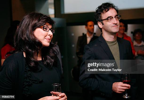 Actors Lisa Ray and Don McKellar open the market at the Toronto Stock Exchange in celebration of the 34th Toronto International Film Festival and...